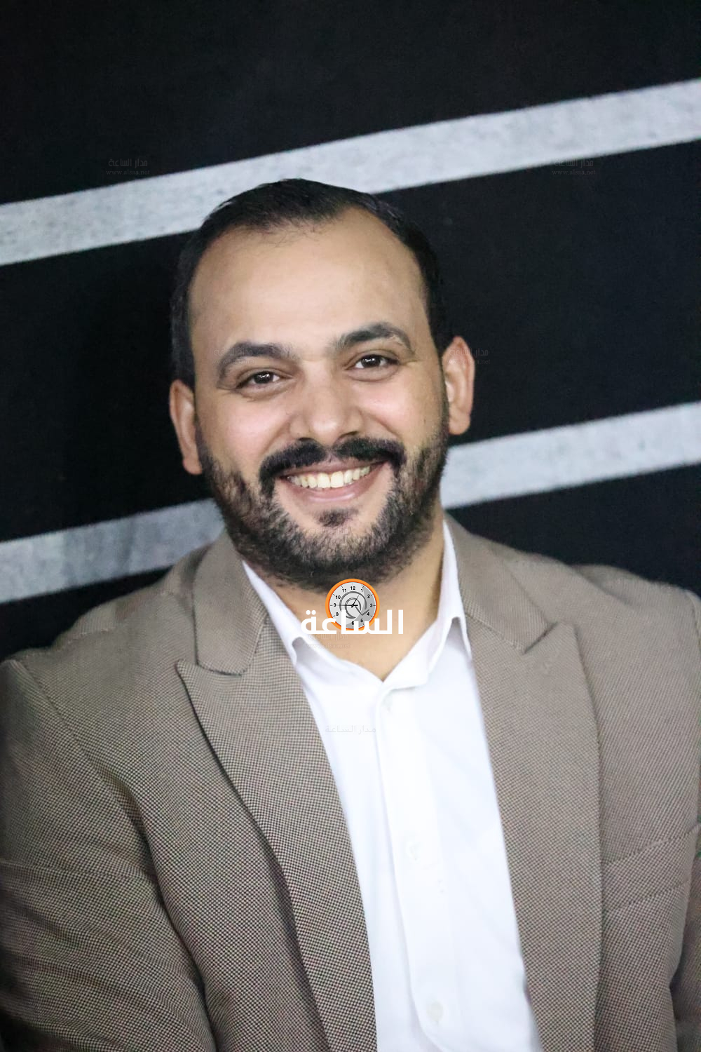 Madar Al-Saa Images 0.493725644136467