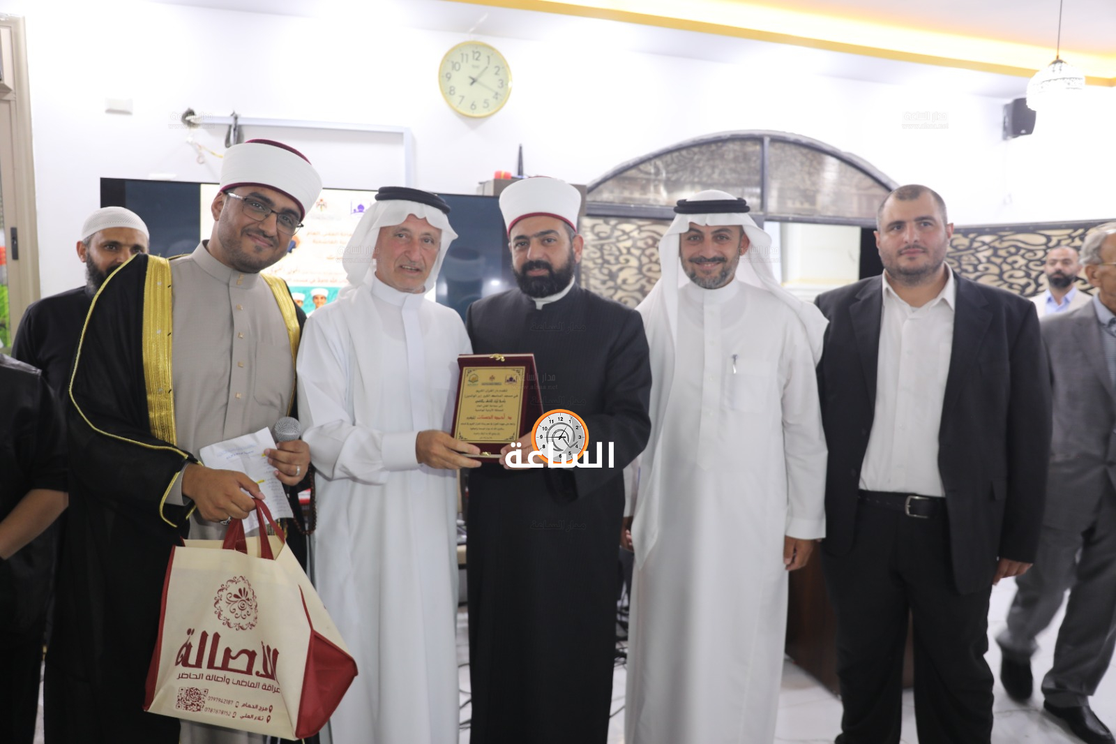 Madar Al-Saa Images 0.38960321768582984