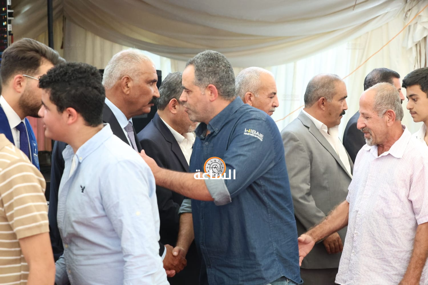 Madar Al-Saa Images 0.3825388159490739