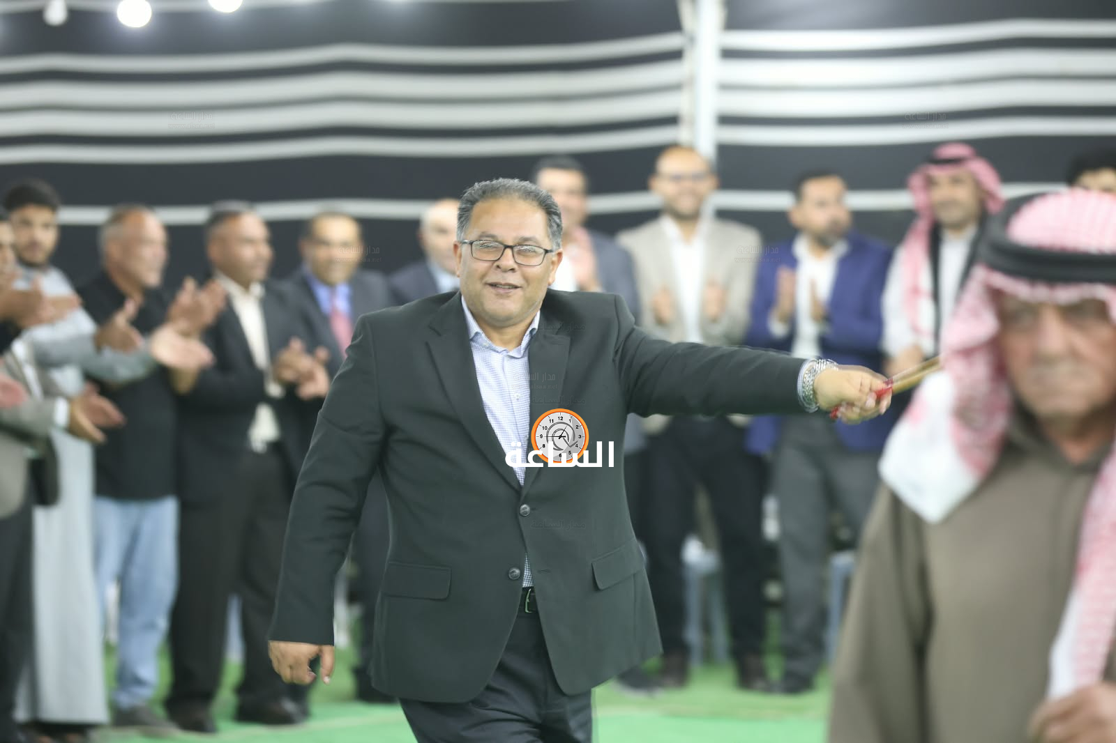 Madar Al-Saa Images 0.04951354828748389