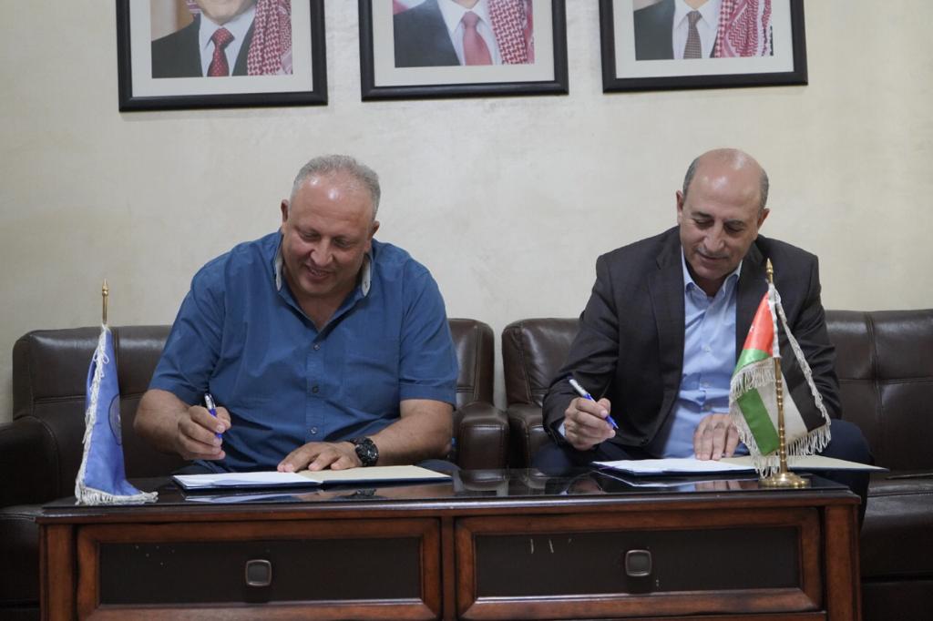 الخيرية الهاشمية وكاريتاس الأردن توقعان اتفاقية