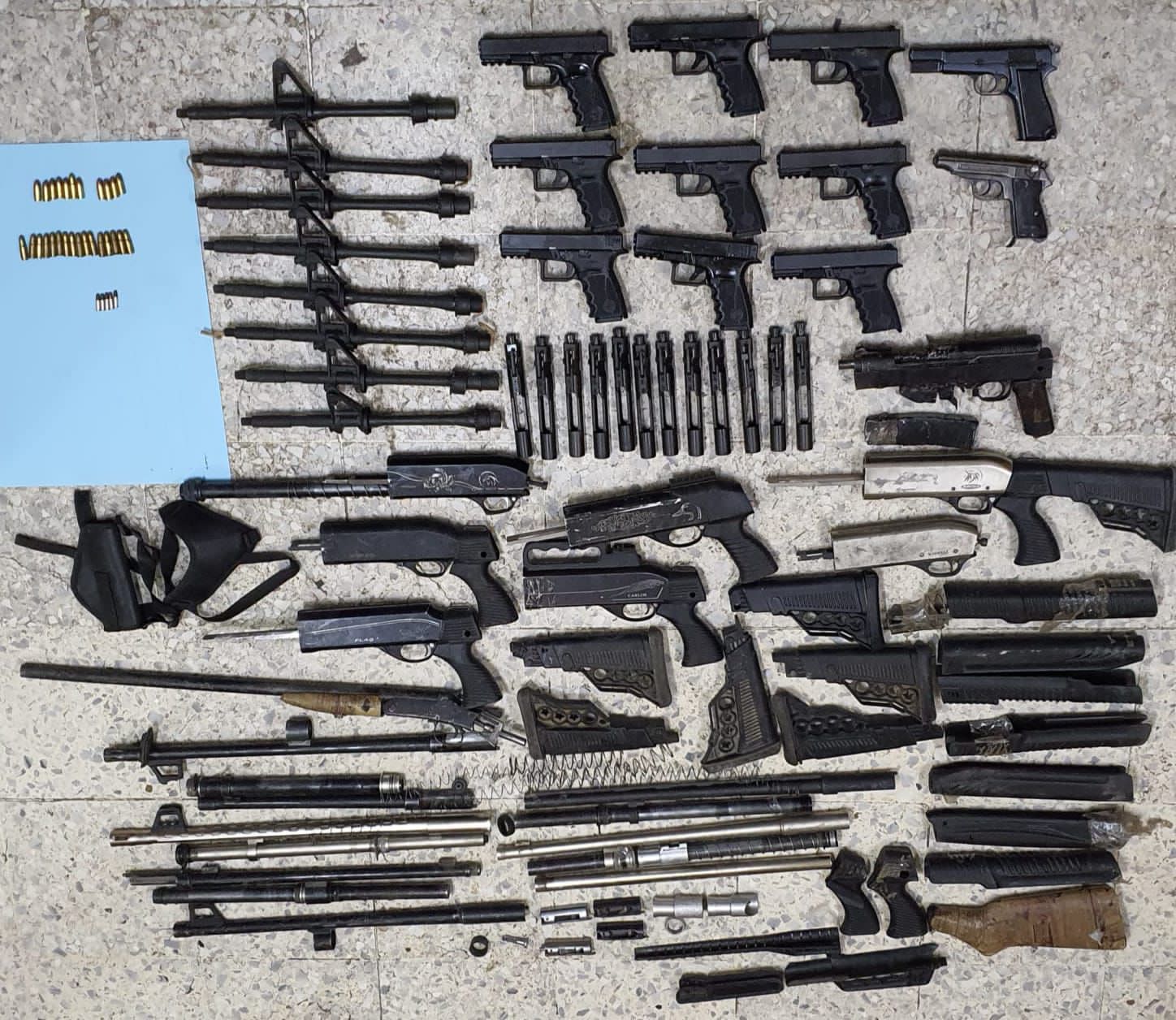 ضبط كمية كبيرة من الأسلحة النارية