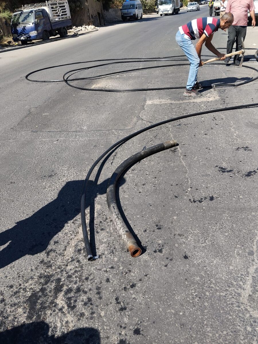 ضبط اعتداءات لتعبئة صهاريج بوادي السير