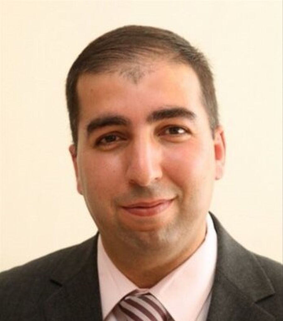 د. السلايمة عميد الكلية الجامعية الوطنية