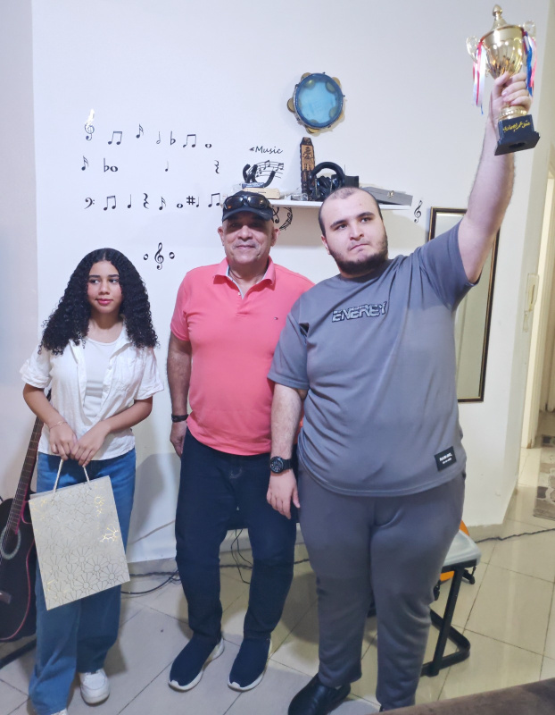 عقل الصمادي المصاب بـالتوحد يحصد المركز