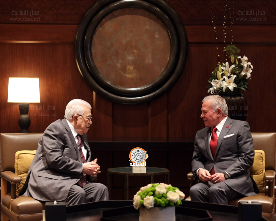 الملك يلتقي الرئيس عباس