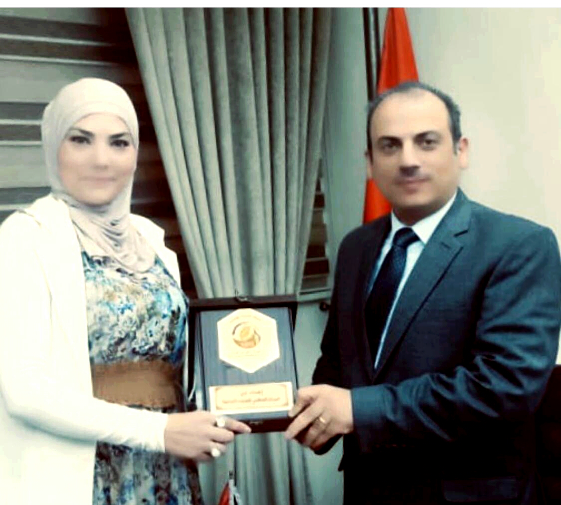 الوطني للبحوث الزراعية يكرم باحثة حاصلة