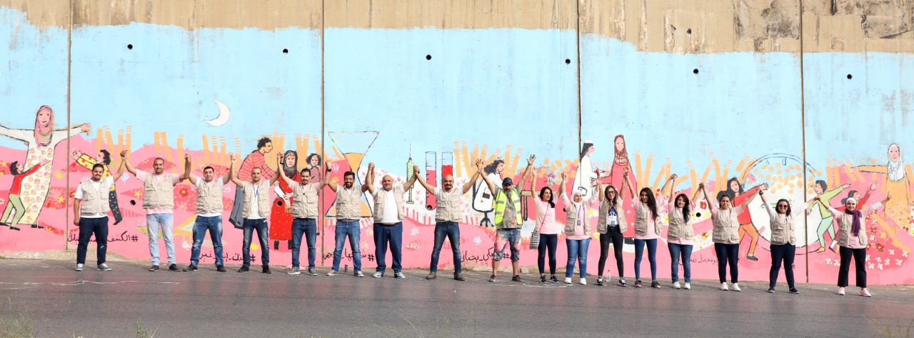 بنك الإسكان يشارك في رسم جدارية