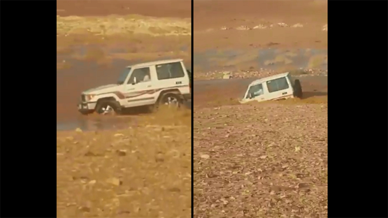 سعودي يغامر بحياته ويتحدى سيلا بسيارته