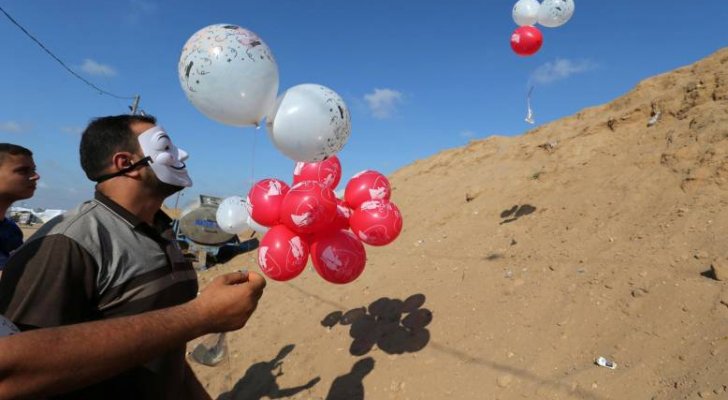 حماس توافق على وقف اطلاق البالونات