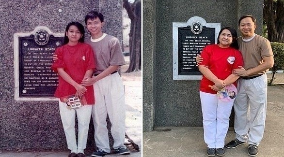 يساعد والديه على إعادة صورة التقطت