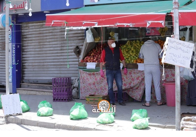 استمرار سوق المدينة الشعبي بتوزيع الخضار