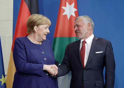 الملك وميركل يؤكدان أهمية توحيد الجهود