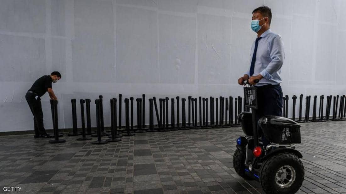 العاصمة الصينية تخفض حالة الطوارئ لأزمة