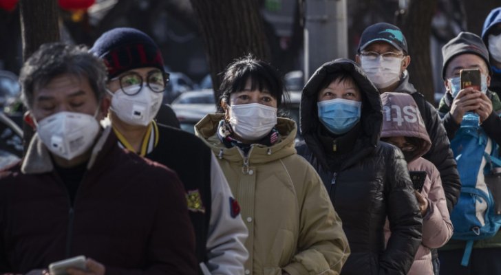 الصين تفحص سكان مدينة كاملة بعد