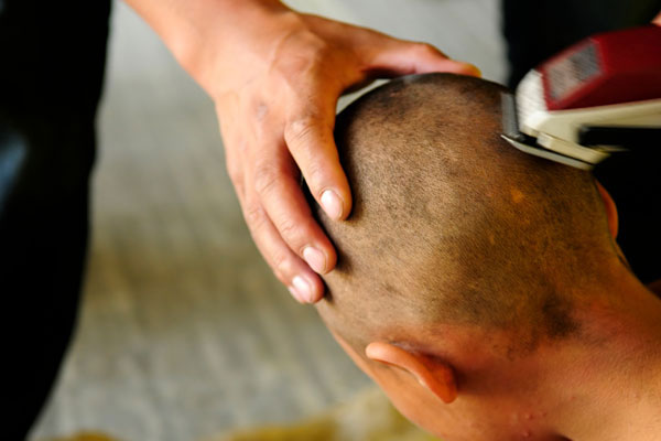 مادبا.. حلاقة على ’الصفر‘ لـ 14