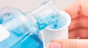 كيف يتفاعل غسول الفم مع فيروس