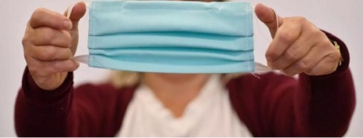 لقاحات كورونا لن تغني عن الكمامات..