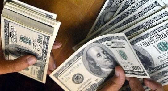 الدولار الأميركي الخاسر الأكبر في 2021