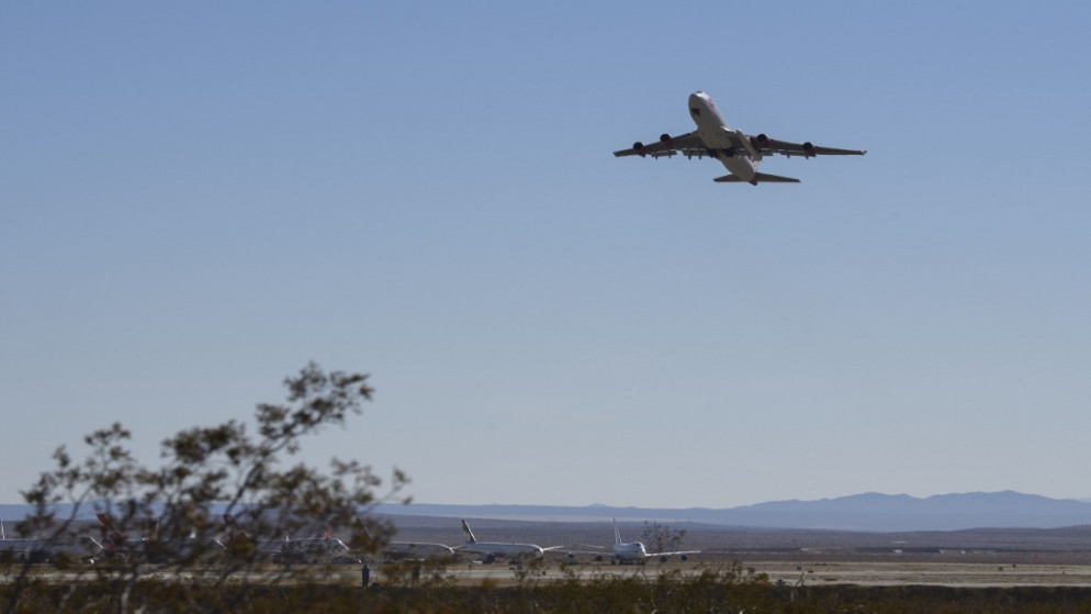 بايدن لن يرفع حظر السفر المفروض