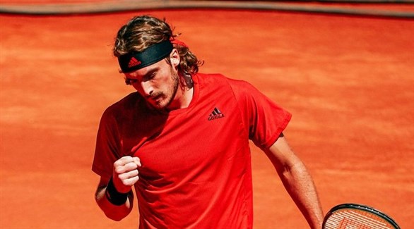 تسيتسيباس يهزم أوجيه ألياسيم ويضرب موعدا