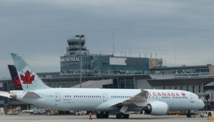 كندا تعلق الرحلات القادمة من الهند