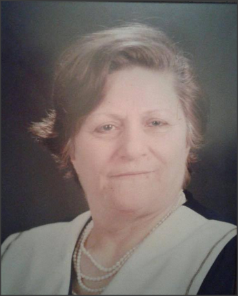 البطيخي ترثي والدتها بمرور 18 عاما