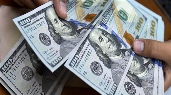تراجع الدولار عن مستوى قياسي