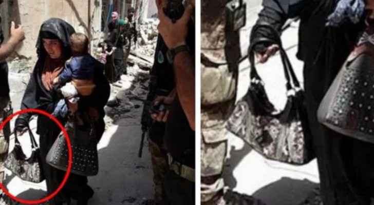 صورة صادمة.. أم داعشية تفجر نفسها