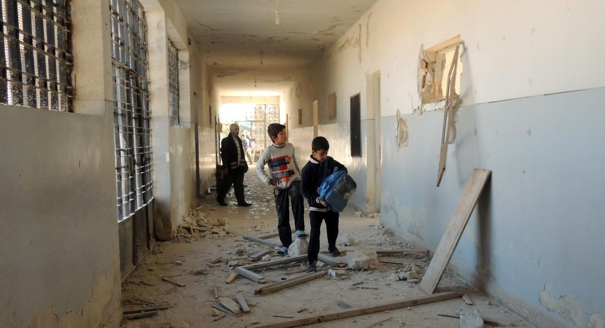 مدارس في سوريا تمحو الأسد من