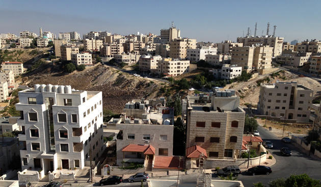 إخلاء عمارة في ضاحية الرشيد