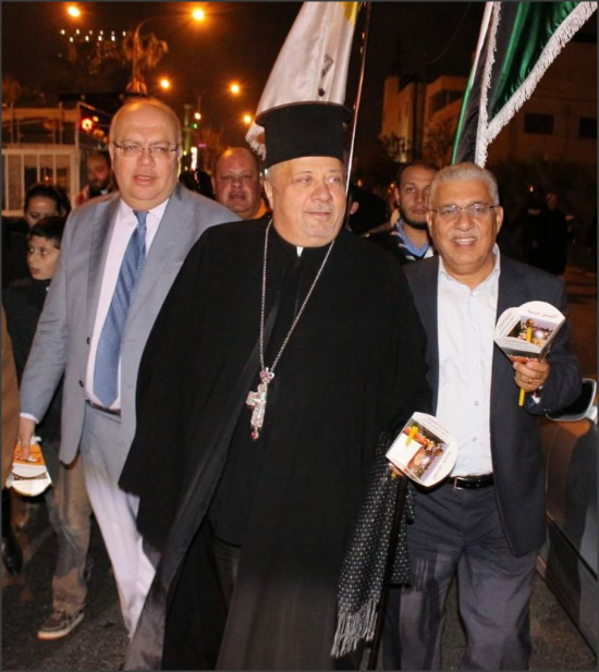 مسيرة شموع وأجراس كنائس تقرع في