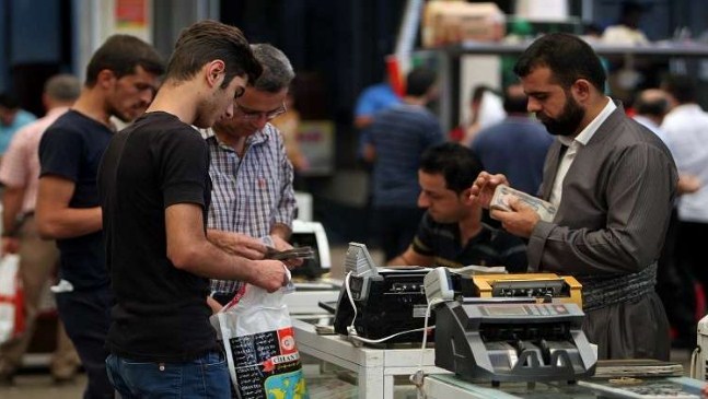 العراق يدفع رواتب موظفي كردستان لأول