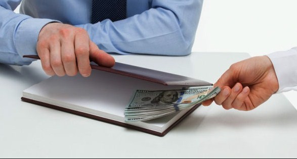 ضبط أردنية عرضت رشوة على محقق