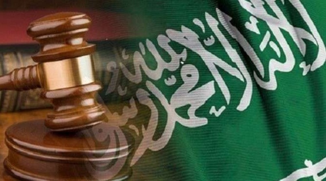 صدام حسين ومعمر القذافي في قرار