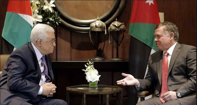 الملك يهنئ عباس بإعادة انتخابه