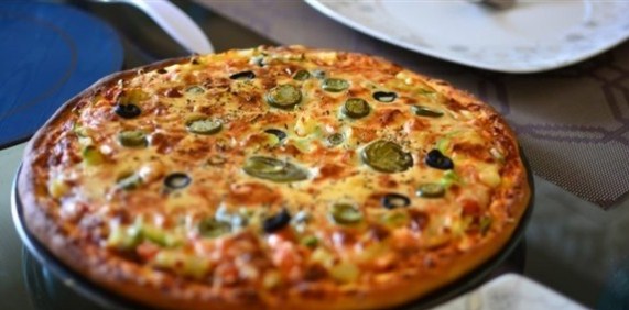 اشترا قطعتي بيتزا بالبيتكوين قبل 8