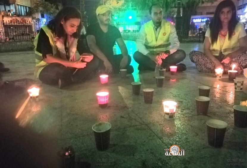 اشعال الشموع وفاء للوطن وشهداء الوطن