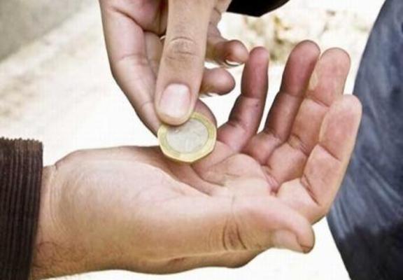 ضبط متسول بحوزته 236 دينارا ويحمل