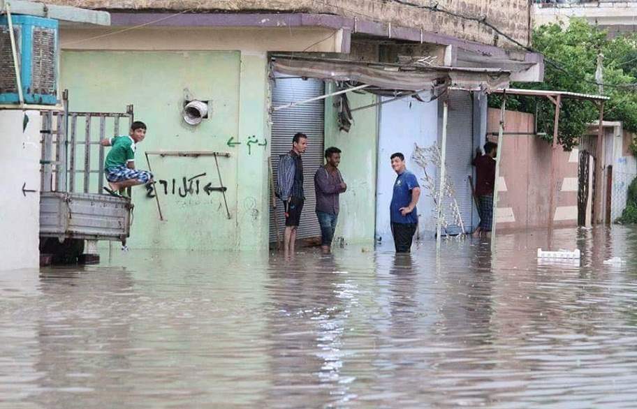 غرق عشرة أحياء سكنية بالموصل جراء