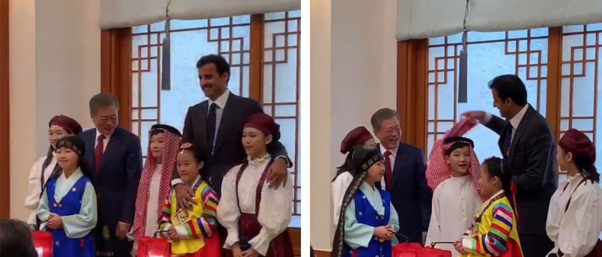 شاهد: أمير قطر يعدل ’شماغ‘ طفل