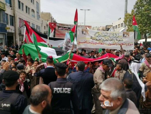 مسيرة تأييد لـ الملك في ماركا