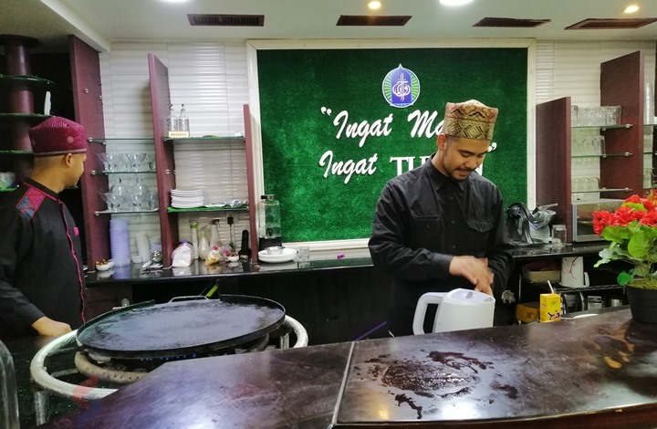 مطعم طلبة ماليزيين بالأردن يقدم وجبات