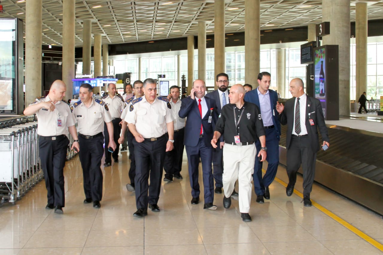 الرحامنة وفوزي الملقي في المطار (صور)