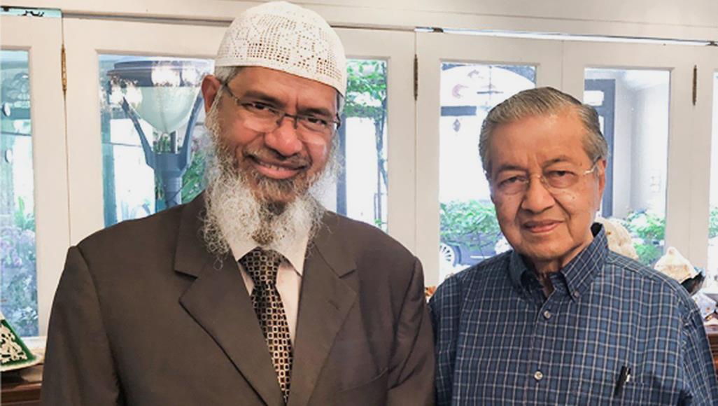 رفض تسليمه للهند.. مهاتير محمد يتعهد