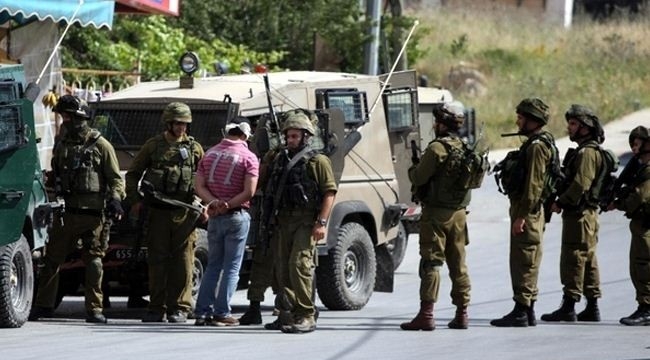 الاحتلال يعتقل 23 فلسطينيا