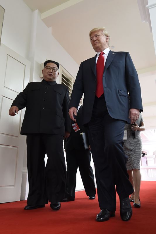 الرئيس الاميركي دونالد ترامب والزعيم الكوري الشمالي كيم جونغ-أون