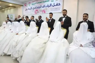 الأردن: زفاف جماعي لعشرين عريسا وعروسا