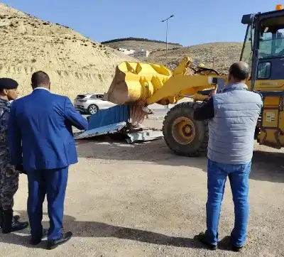 حملة أمنية لإزالة الاعتداءات على شارع