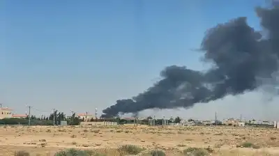 كوادر الدفاع المدني تتعامل مع حريق